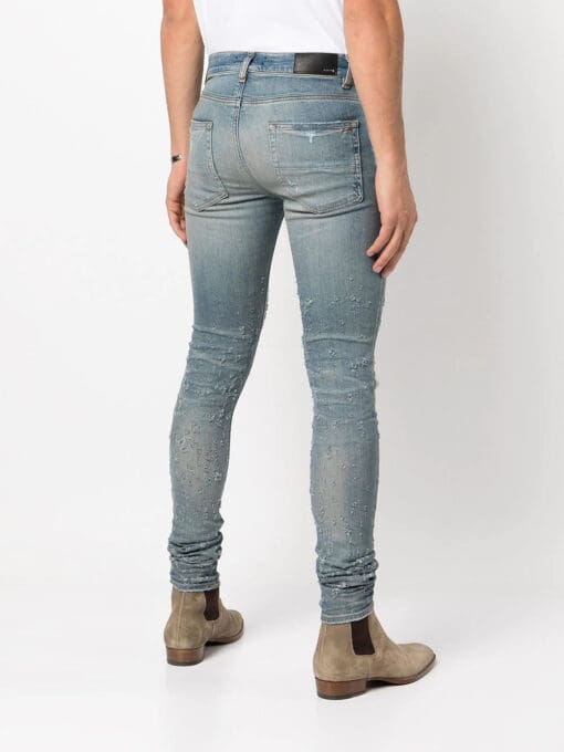 Amiri distressed skinny jeans - Image 4