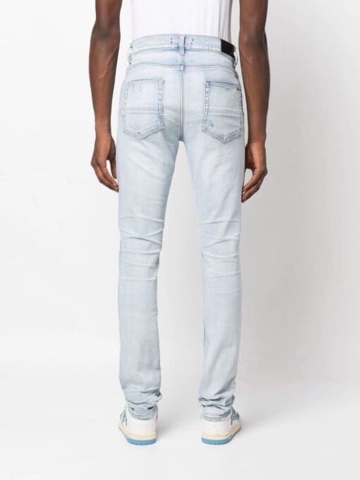 Amiri distressed slim-fit jeans - Image 4