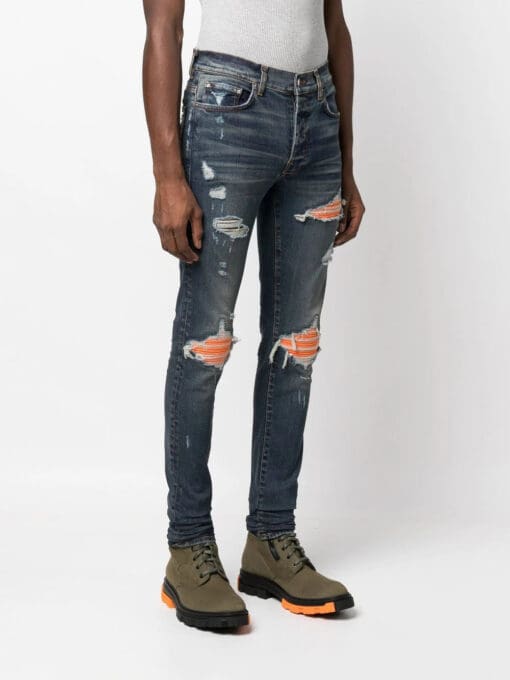 Amiri distressed panelled skinny jeans - Image 3