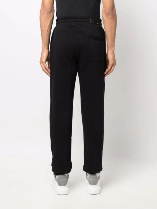 AMIRI  logo-print track pants - Image 4