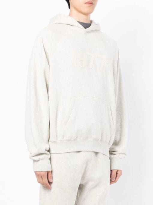 FEAR OF GOD ESSENTIALS  '1977' print hoodie - Image 3