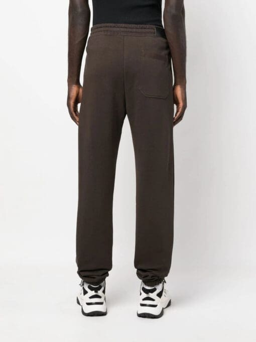 AMIRI  logo-embroidered track pants - Image 4