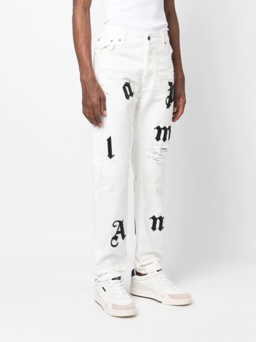 Palm Angels  logo-patch distressed jeans - Image 3